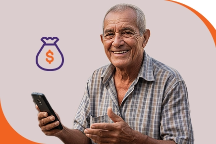 Casal de idoso olhando tablet e sorrindo por causa dos benefícios do Empréstimo Consignado Bmg